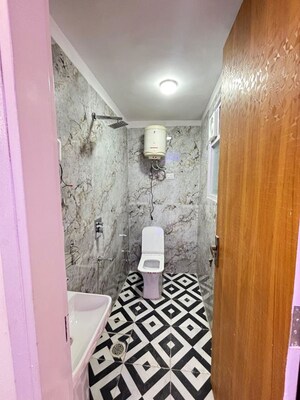 Bathroom in 3 BHK Builder Floor at Palm Residency Chhatarpur, Chattarpur – for Rent