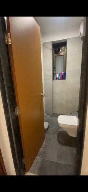 Bathroom in 2 BHK Apartment at Dev Leo Tower, Oshiwara – for Rent