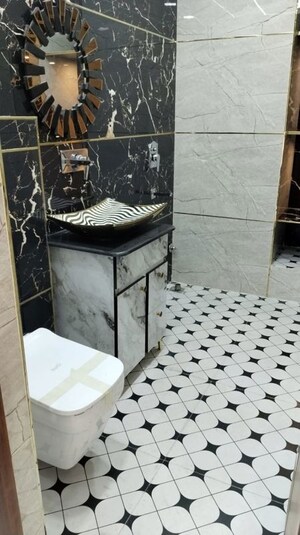 Bathroom in 4 BHK Apartment at Sector 6 Dwarka – for Rent