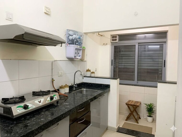 Kitchen, amanora-adreno-towers 3 Bedroom 1300 Sq.Ft. Apartment In Hadapsar Pune 10399488