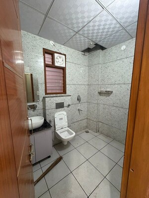 Bathroom in 3 BHK Apartment at Sector 6 Dwarka – for Rent