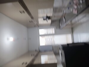 Kitchen in 3 BHK Apartment at Nirala Estate, Tech Zone 4 Greater Noida – for Rent