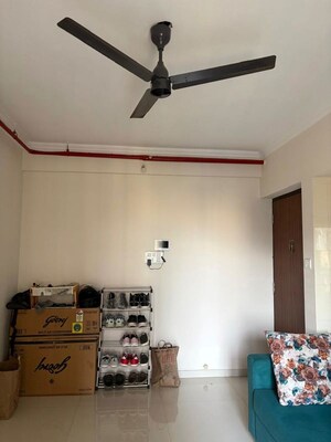 Living Room in 1 BHK Apartment at Raunak Bliss, Ghodbunder Road – for Rent