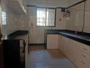 Kitchen in 3 BHK Apartment at Serenity Heights, Malad West – for Rent