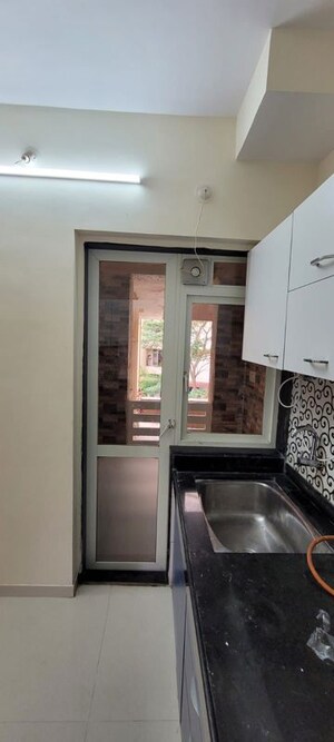 Kitchen in 2 BHK Apartment at Cosmos Enclave, Kasarvadavali – for Rent