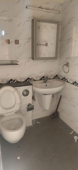Bathroom in 2 BHK Apartment at Group Seven Rushi Heights, Goregaon East – for Rent