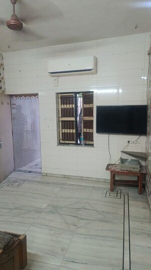 Living Room in 1 BHK Apartment at Jivraj Park – for Rent