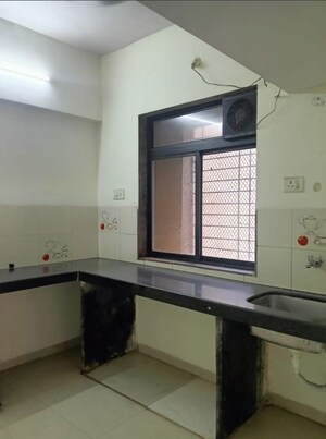 Kitchen in 2 BHK Apartment at Bhumiraj Twin Bridge, Ghansoli – for Sale