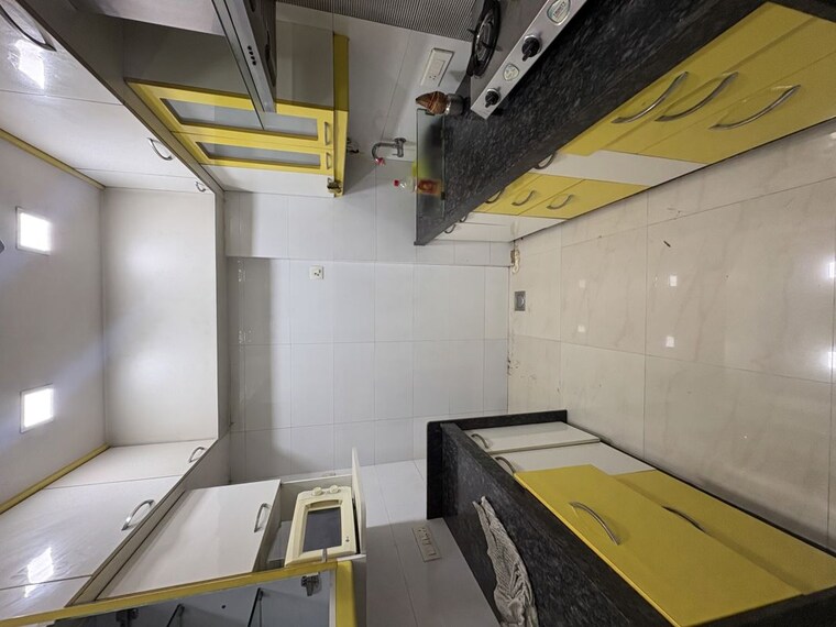 Kitchen, kalpana-chs-tilak-nagar 2 Bedroom 680 Sq.Ft. Apartment In Tilak Nagar Mumbai 10399875