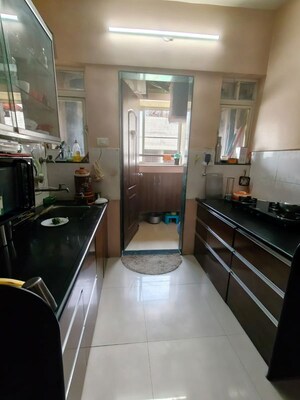 Kitchen in 1 BHK Apartment at Shree Balaji Orchard Park, Bavdhan – for Rent