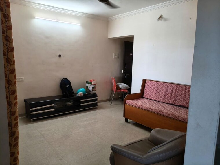 Living Room, akshay-center 1 Bedroom 750 Sq.Ft. Apartment In Wakad Pune 10399940