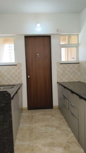 Kitchen in 2 BHK Apartment at Rigved Uptown, Balewadi – for Rent
