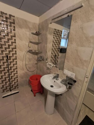 Bathroom in 3 BHK Apartment at Gaur Atulyam, Omicron I Greater Noida – for Rent