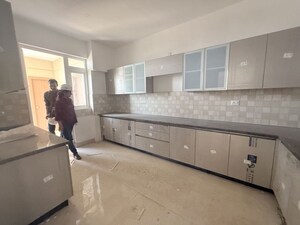 Kitchen in 3 BHK Apartment at ATS Picturesque Reprieves, Sector 152 – for Rent