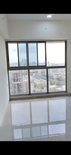 Room in 2 BHK Apartment at Sheth Auris Bliss, Malad West – for Rent