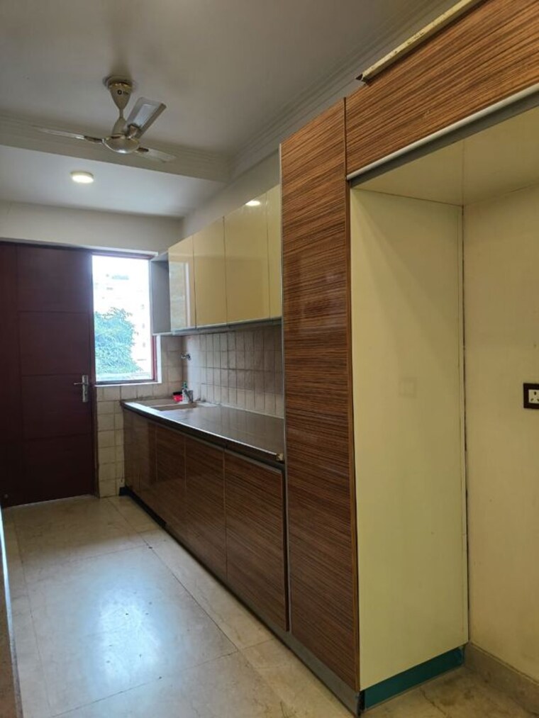 Kitchen, unitech-singleton-floors-south-city 3 Bedroom 240 Sq.Ft. Builder Floor In Sector 50 Gurgaon 10400183