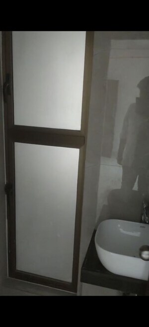 Bathroom in 1 BHK Apartment at Raymond Realty Phase II, Pokhran Road No Two – for Sale