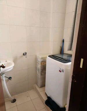 Bathroom in 3 BHK Apartment at Purvanchal Heights, Zeta I Greater Noida – for Rent