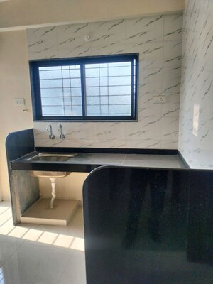 Kitchen in 2 BHK Apartment at Apple Elite, Rahatani – for Sale