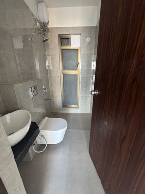 Bathroom in 2 BHK Apartment at Raymond Realty Phase II, Pokhran Road No Two – for Sale