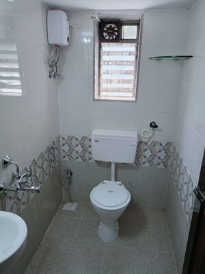 Bathroom in 3 BHK Apartment at Sai Darshan CHS Andheri West, Andheri West – for Sale