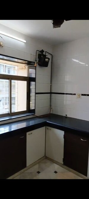 Kitchen in 1 BHK Apartment at Vishal Su-Shee Apartment, Vile Parle East – for Rent