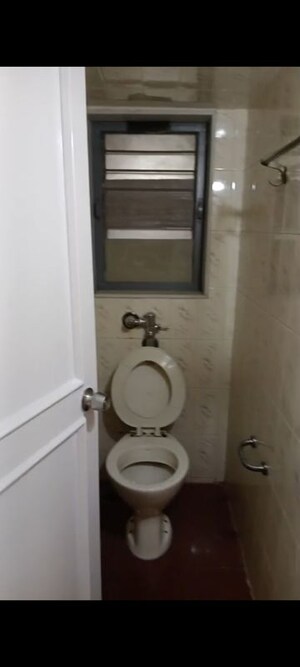 Bathroom in 1 BHK Apartment at Vishal Su-Shee Apartment, Vile Parle East – for Rent