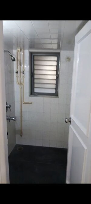 Bathroom in 1 BHK Apartment at Vishal Su-Shee Apartment, Vile Parle East – for Rent