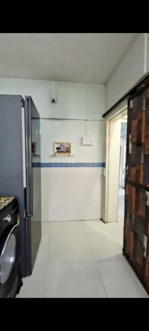 Bathroom in 1 BHK Apartment at Anirudha CHS, Vile Parle East – for Rent