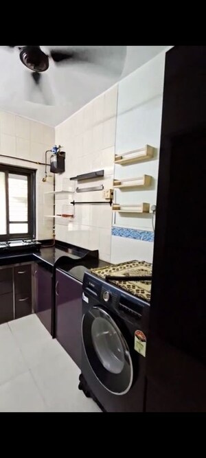 Kitchen in 1 BHK Apartment at Anirudha CHS, Vile Parle East – for Rent