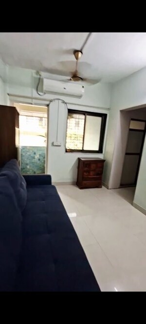 Living Room in 1 BHK Apartment at Anirudha CHS, Vile Parle East – for Rent