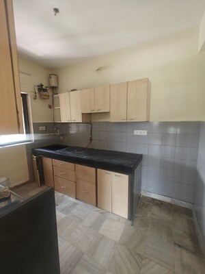 Kitchen in 2 BHK Apartment at Ahuja Harbour Estate , Nerul Sector 19a – for Rent