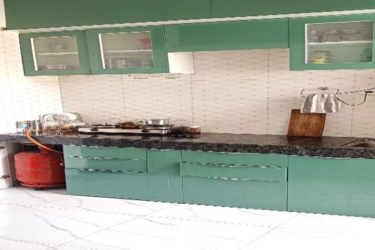 Kitchen, bella-casa 1 Bedroom 585 Sq.Ft. Apartment In Kharadi Pune 10400332