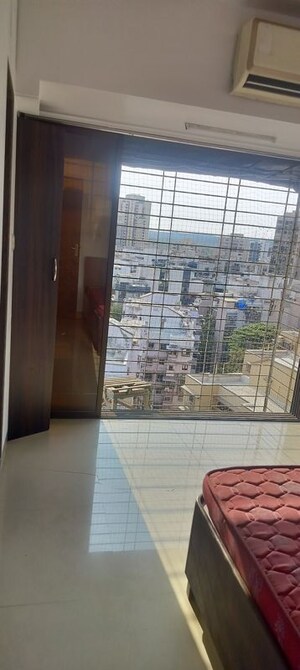 Room in 1 BHK Apartment at Brighton Tower, Andheri West – for Rent