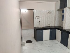 Kitchen in 2 BHK Builder Floor at Kamgar Putala Vasahat – for Rent