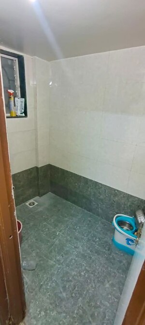 Bathroom in 2 BHK Apartment at Anand Plaza CHS, Wadgaon Sheri – for Rent