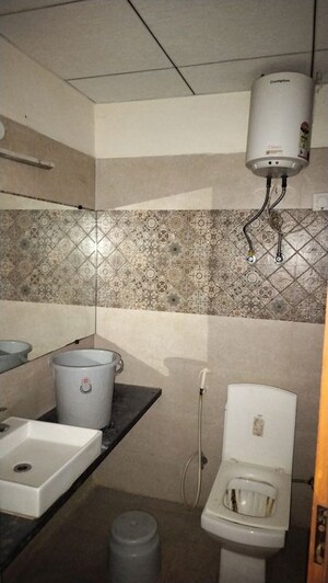 Bathroom in 1 RK Apartment at Paramount Golf Forest Studio Apartments - OAK Towe, Zeta I Greater Noida – for Rent