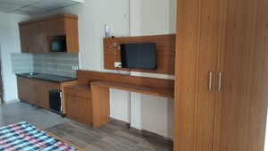 Kitchen in 1 RK Apartment at Paramount Golf Forest Studio Apartments - OAK Towe, Zeta I Greater Noida – for Rent