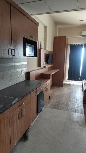 Kitchen in 1 RK Apartment at Paramount Golf Forest Studio Apartments - OAK Towe, Zeta I Greater Noida – for Rent