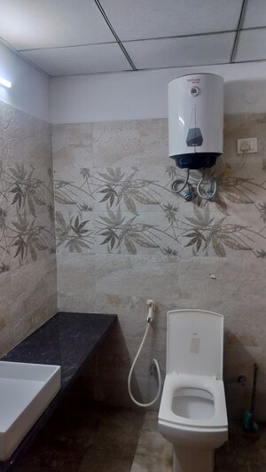 Bathroom in 1 RK Apartment at Paramount Golf Forest Studio Apartments - OAK Towe, Zeta I Greater Noida – for Rent