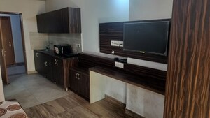 Kitchen in 1 RK Apartment at Paramount Golf Forest Studio Apartments - OAK Towe, Zeta I Greater Noida – for Rent
