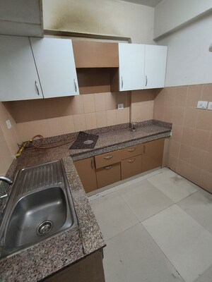 Kitchen in 2 BHK Apartment at Paramount Floraville, Sector 137 – for Rent