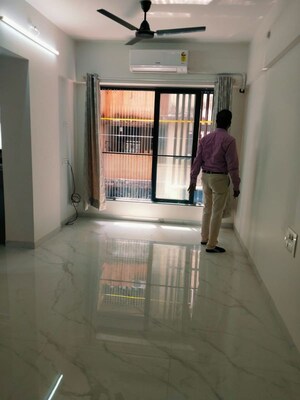 Living Room in 1.5 BHK Apartment at Rustomjee Seasons Bandra East, Bandra East – for Rent