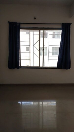 Bedroom in 3 BHK Apartment at Hingne Budrukh – for Rent