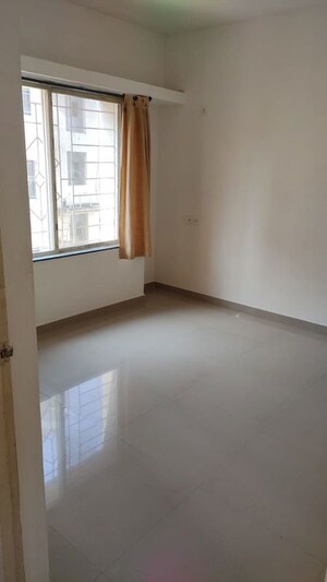 Bedroom in 3 BHK Apartment at Hingne Budrukh – for Rent