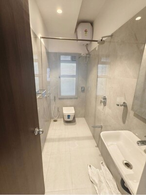 Bathroom in 3 BHK Apartment at Sigma Emerald, Santacruz East – for Rent