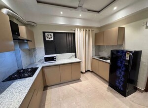 Kitchen in 2 BHK Apartment at Suncity Vatsal Valley, Gwal Pahari – for Rent