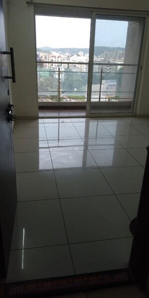 Bedroom in 1 BHK Apartment at Paranjape Forest Trails Pebbles, Bhugaon – for Rent