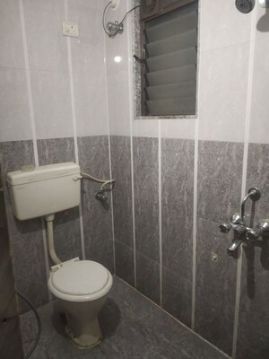 Bathroom in 2 BHK Apartment at Mahavir Plaza, Airoli – for Rent