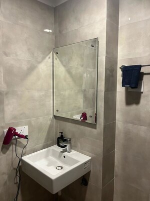 Bathroom in 4 BHK Apartment at Emaar Orange Castle, Gomti Nagar – for Rent